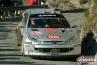 Kresta Roman con la Peugeot 206 WRC al 71° Rally di Montecarlo 2003